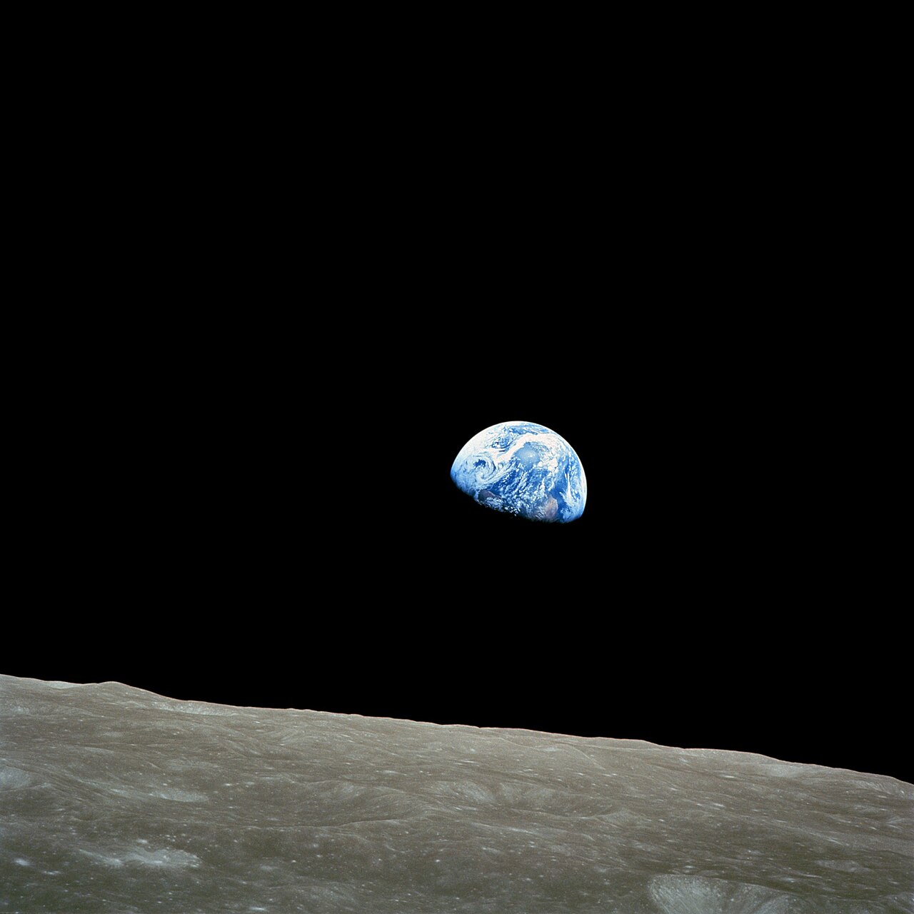 Earthrise — Earth rising over the lunar horizon, photographed by Bill Anders aboard Apollo 8, December 24, 1968.